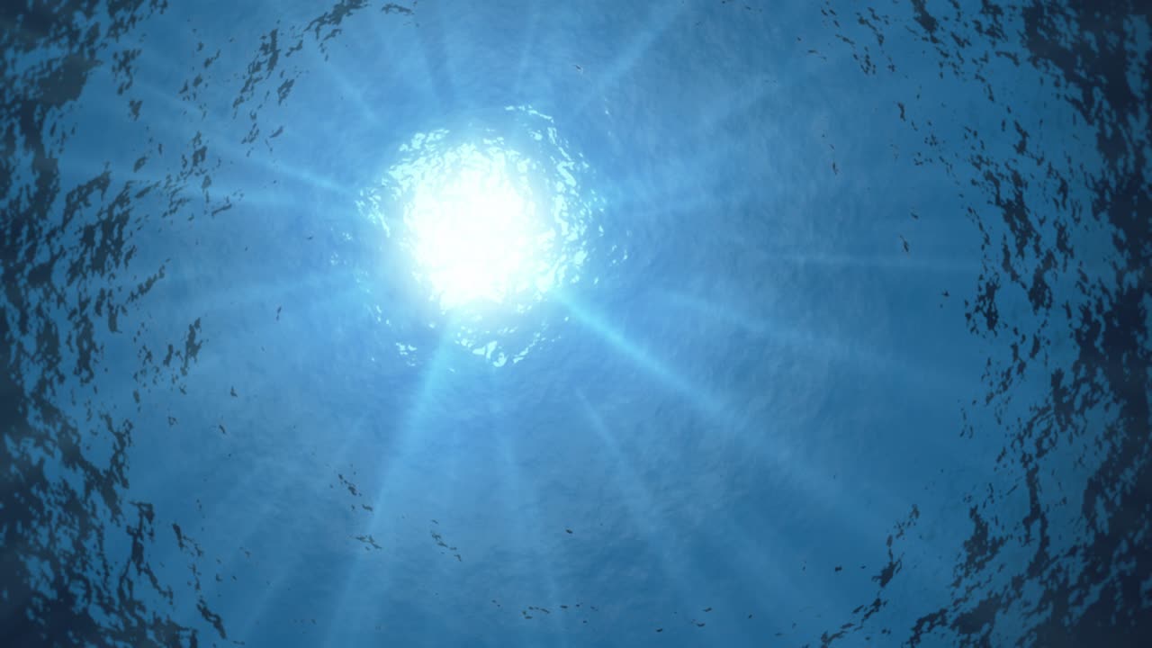 Seamless looping ocean waves from underwater with sunbeams