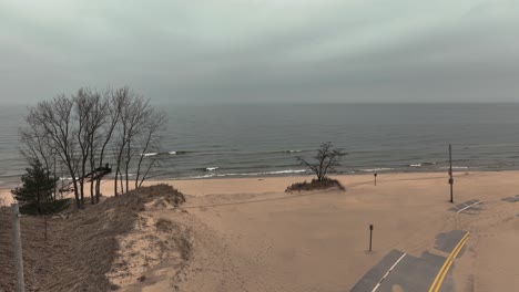 View-of-the-sand-strewn-closed-road-at-the-coast