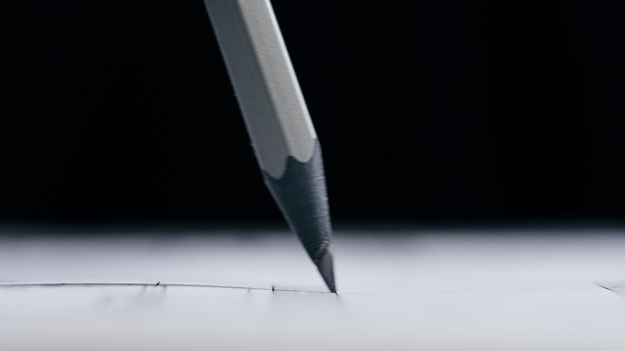 Pencil Drawing a Line on Paper