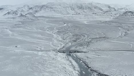 aerial view of ice bridge over frozen river near glaciar langjokull iceland