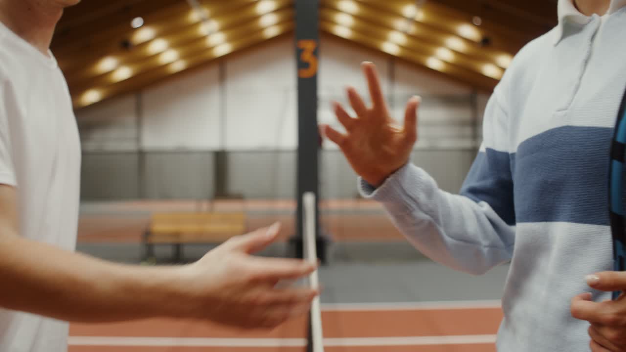 Tennis Players Handshake on Court
