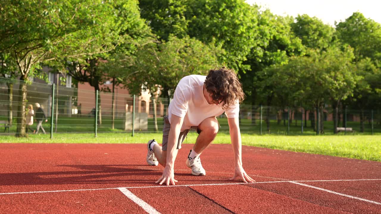 Athlete Training on Running Track