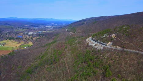 Aerial-drone-video-footage-of-a-scenic,-beautiful,-winding-mountain-highway-in-the-Appalachian-Mountains