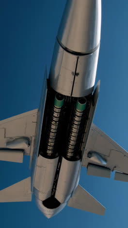 underbelly of a military fighter jet with missiles