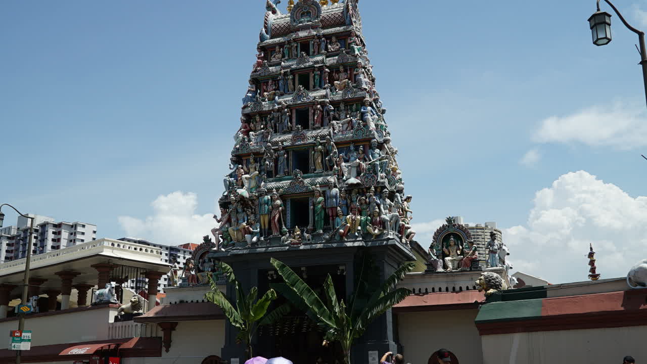 Singapore - Circa August  Time-lapse of a crowd of people in front of a Hindu temple in Singapore.