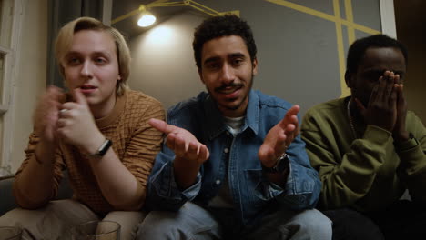 meeting of male friends in an apartment