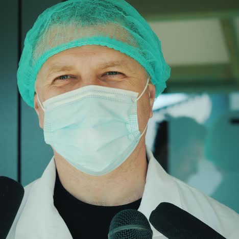 doctor talks to news reporters holding microphones 1