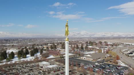 majestic, moroni statue on lds mormon temple in utah - aerial orbit