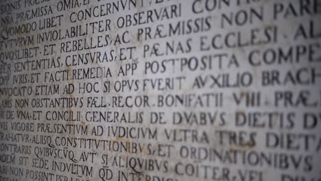 perfect ancient latin inscription on a wall in the historic basilica della santa casa in loreto italy