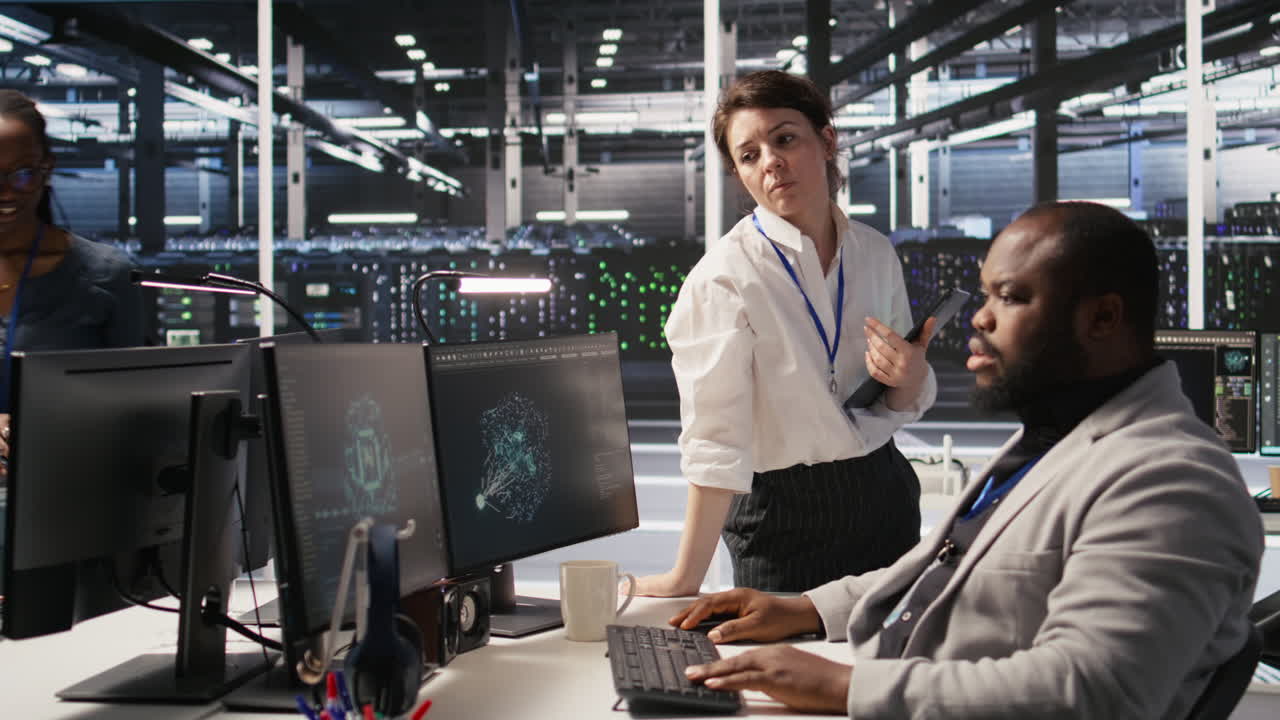 Vertical video Lead data center admin overseeing IT expert integrating AI in equipment rigs