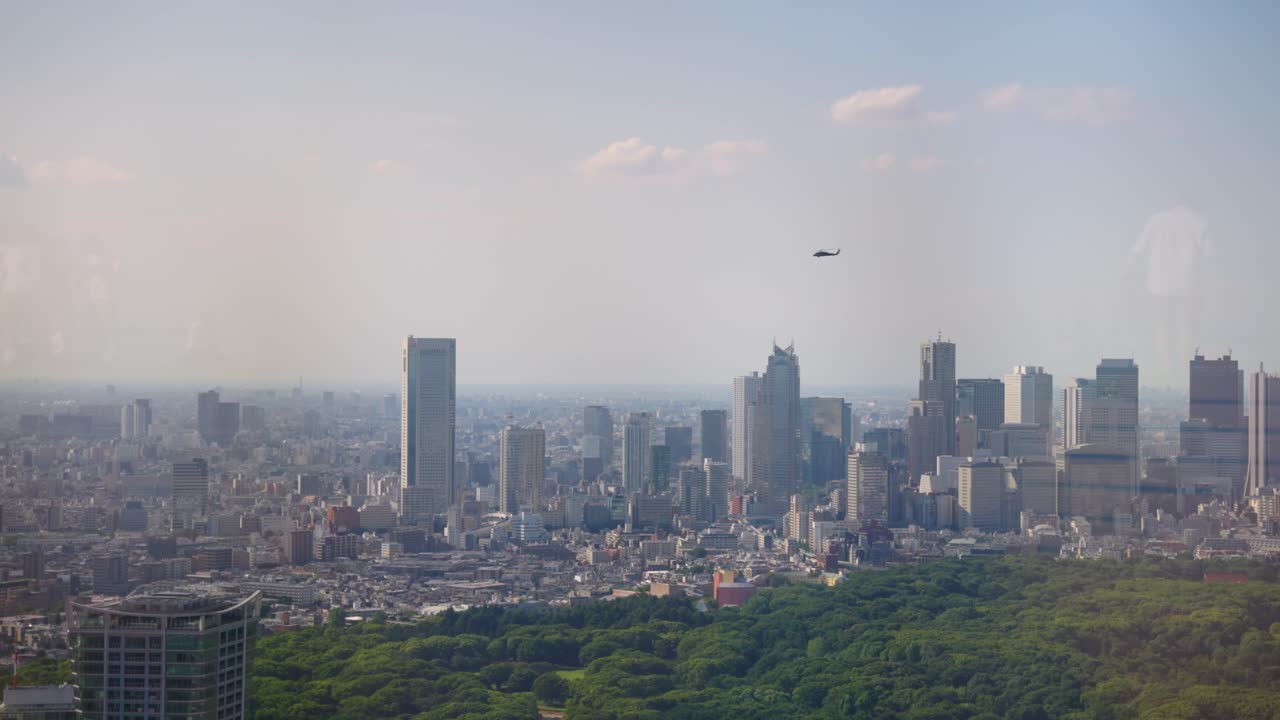 Helicopter Flying over Tokyo City, Japan Establishing Shot in Shibuya Ward