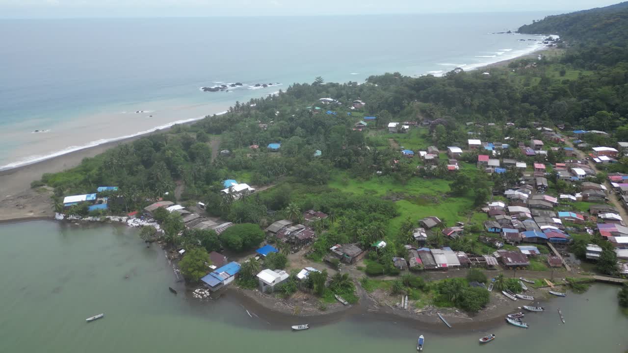 Aerial view of the vibrant beach town El Valle near Bahía Solano in the Chocó Department on the lush Pacific Coast of Colombia