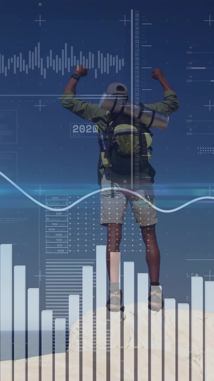 Vertical video: Hiker at peak raising arms jumping while HUD timeline overlaying hiker for tech