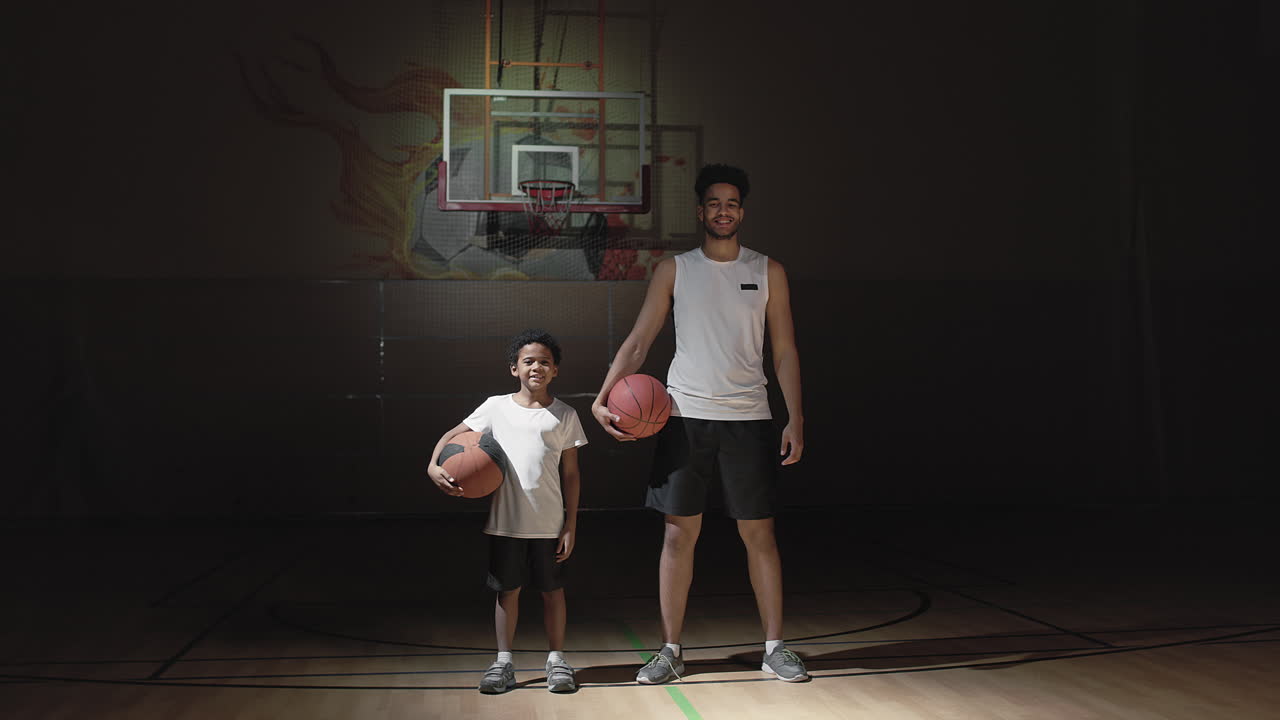 Portrait of Happy Boy and Basketball Player