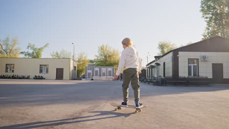 boy skateboarding in park