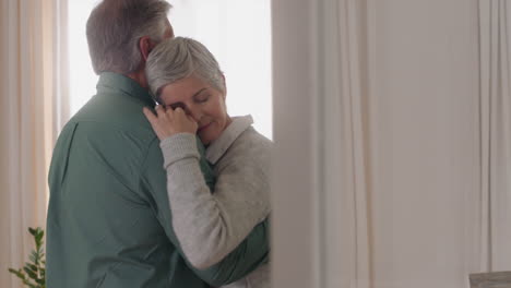 happy mature couple dancing at home enjoying romantic dance together celebrating relationship milestone having peaceful retirement 4k
