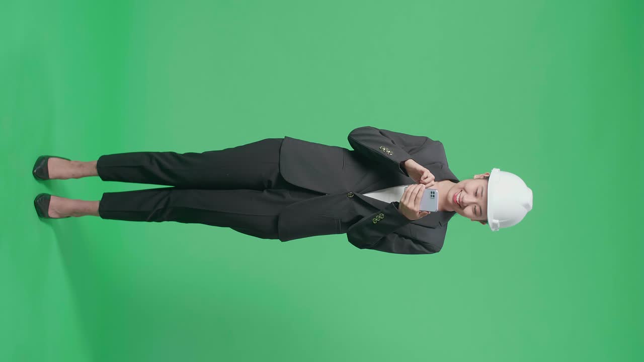 Businesswoman Engineer using a Smartphone