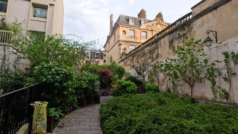 time-lapse of a courtyard transitioning from day to night.