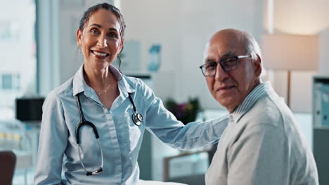 doctor and patient smiling in an exam room