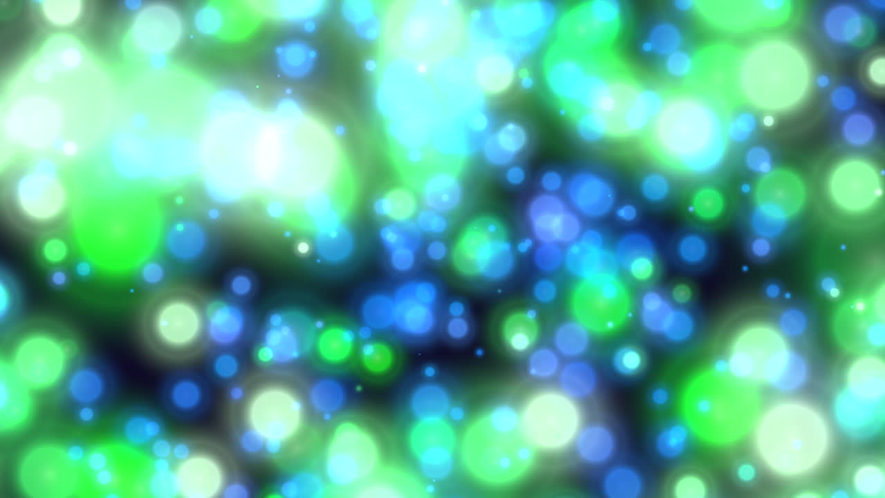 검은 바탕에 원형 패턴으로 다채로운 불빛의 동적 표시