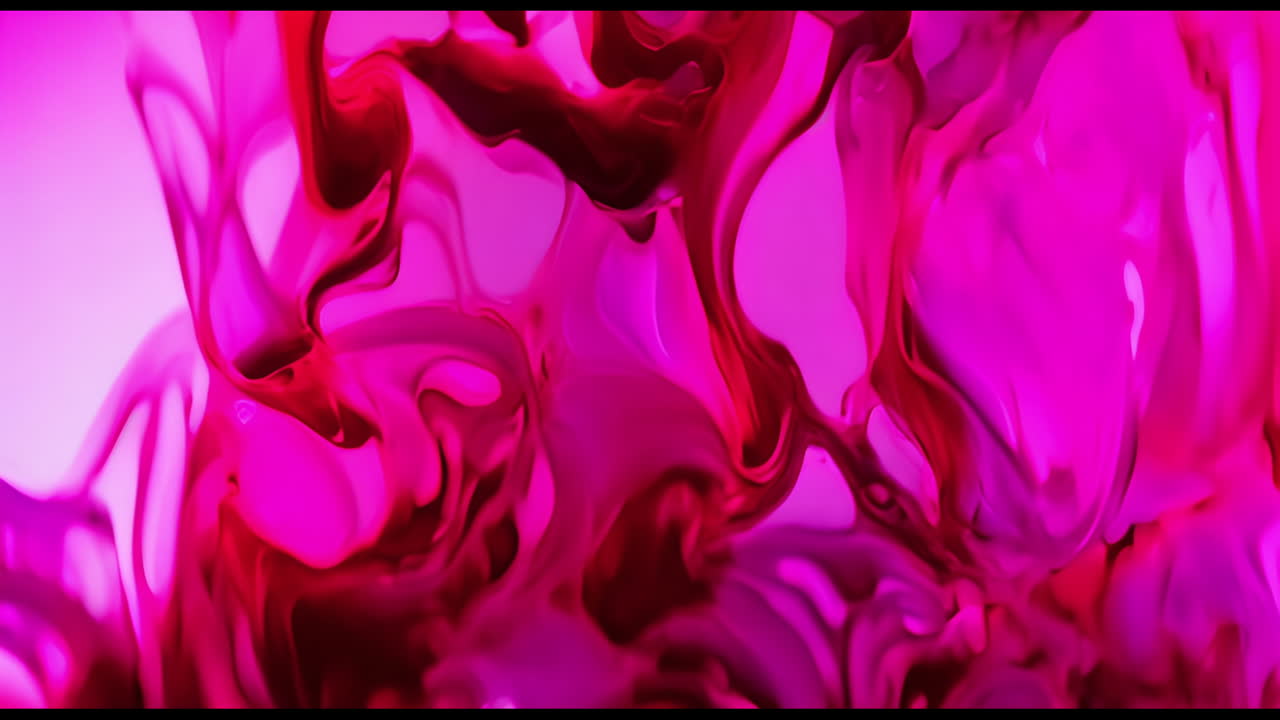 Animation of red liquid moving on purple background