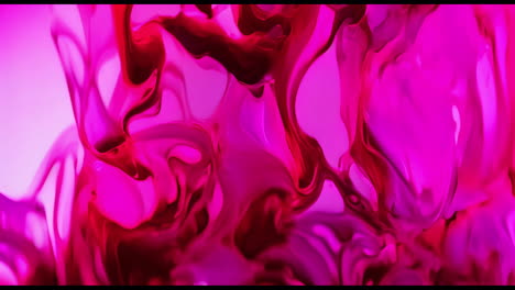 animation of red liquid moving on purple background