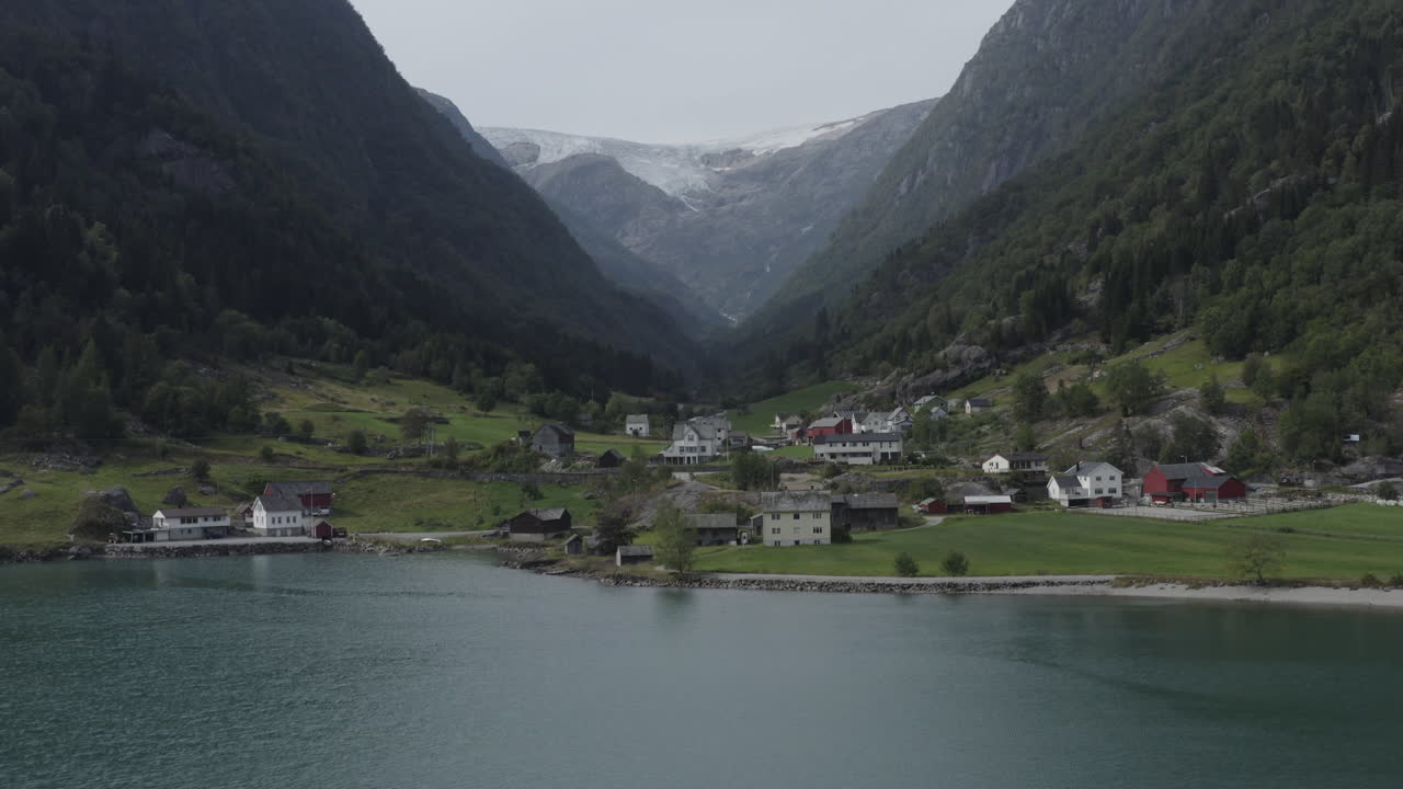 Norwegian Fjord Village with Glacier View