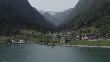 norwegian fjord village with glacier view