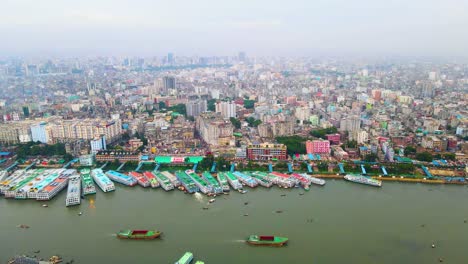 cityscape and port harbor along buriganga river in dhaka, bangladesh