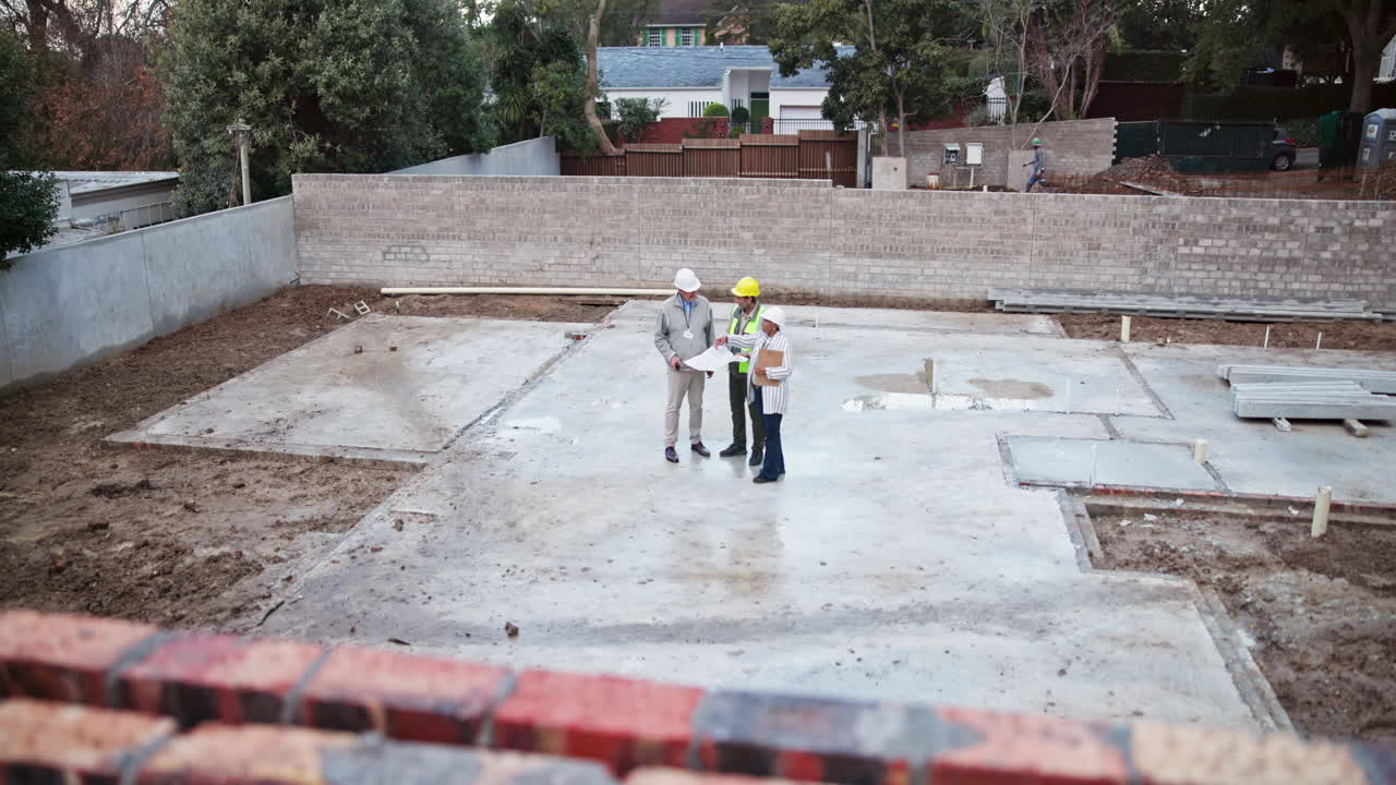 Construction site inspection with architects and engineers