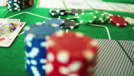 Camera-Flies-Over-Full-Casino-Poker-Table---Casino-Token-Chips-Cards-Playground