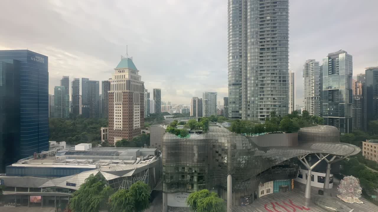 Time lapse overlooking the city center of SIngapore with the iconic ION mall