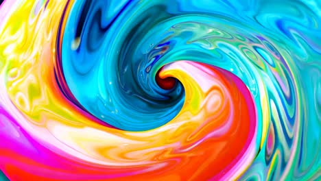 a close up of a colorful swirl of paint on a blue background