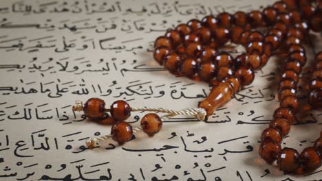 prayer beads on the quran page