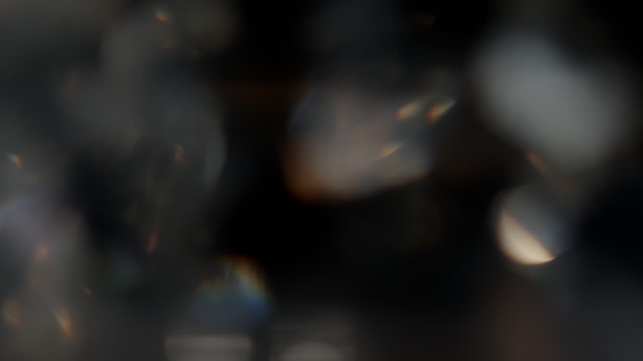 다양한 색상의 빛이 검정색 배경에 4k 푸티지 누출, 비디오 스타일 지정, 전환, 보케 효과