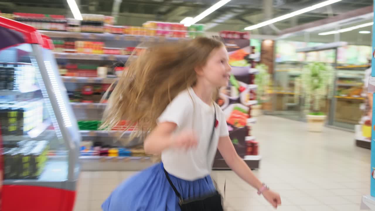 Child running through a supermarket