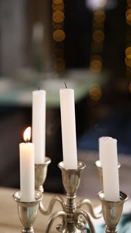 elegant candles on silver candlestick