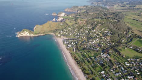 aerial view of a scenic coastal town and beach