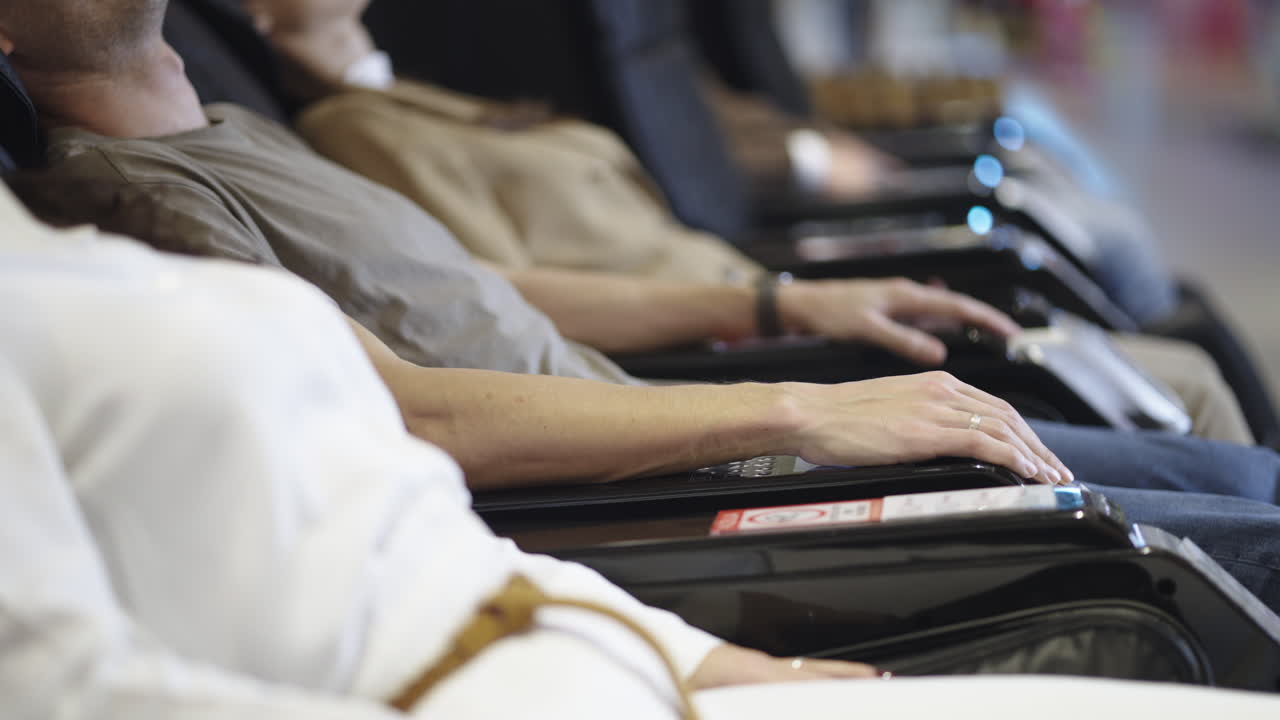 People relaxing in massage chairs