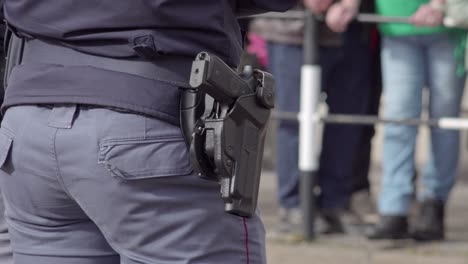 police officer with gun in holster