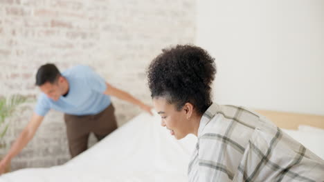 couple, making bed and cleaning in home