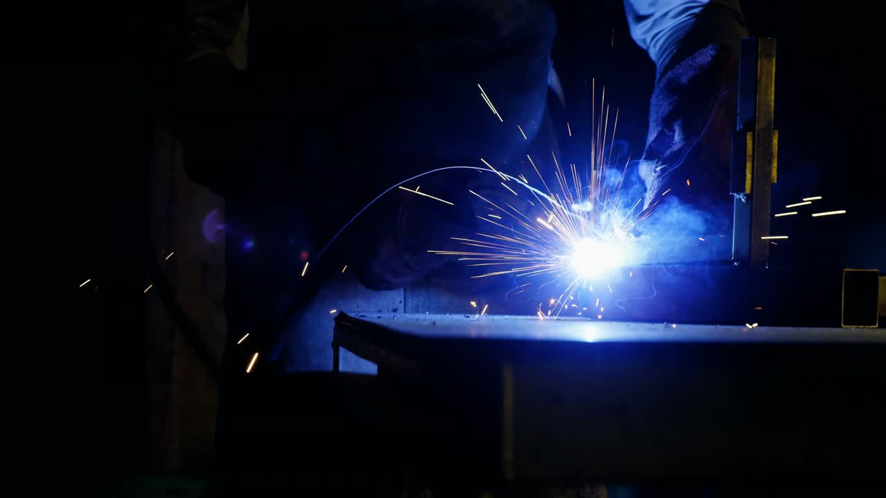Welder welding a metal