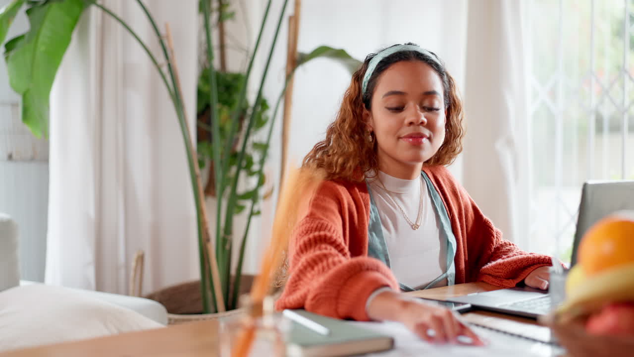 Woman Working from Home on Laptop