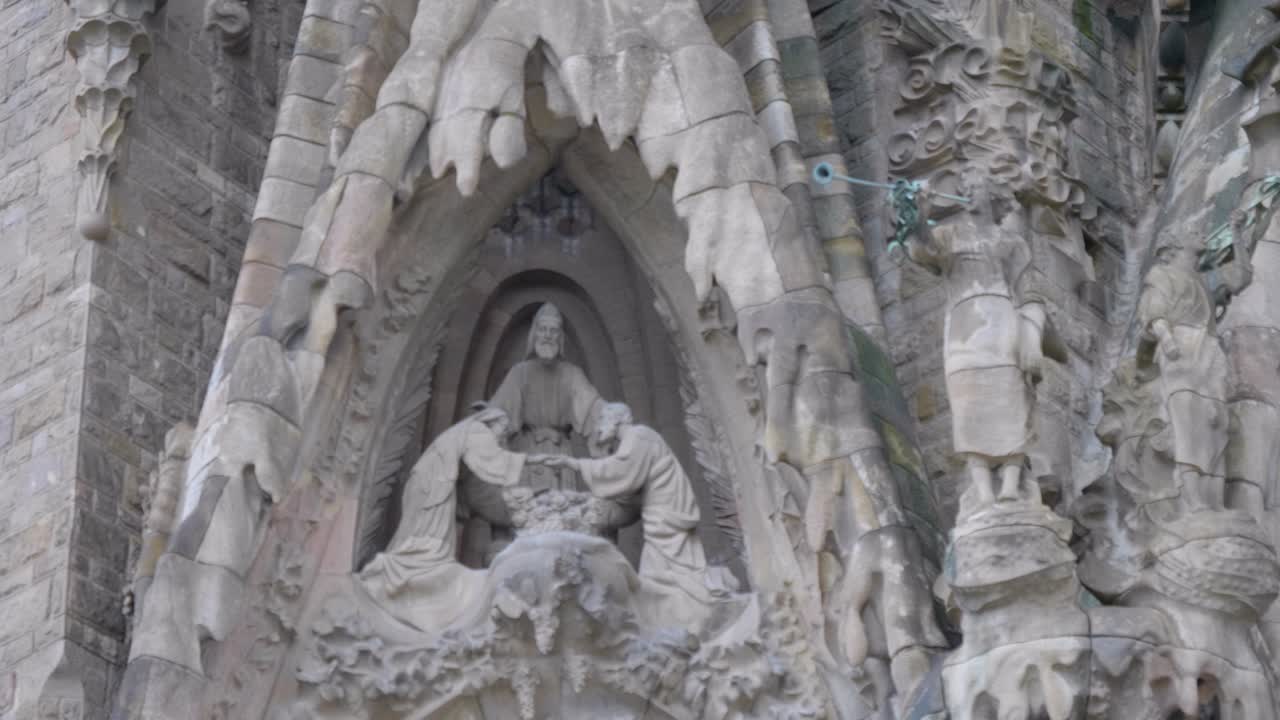 A big close up view of the statues at the great architecture of Sagrada Família, Barcelona, Spain.