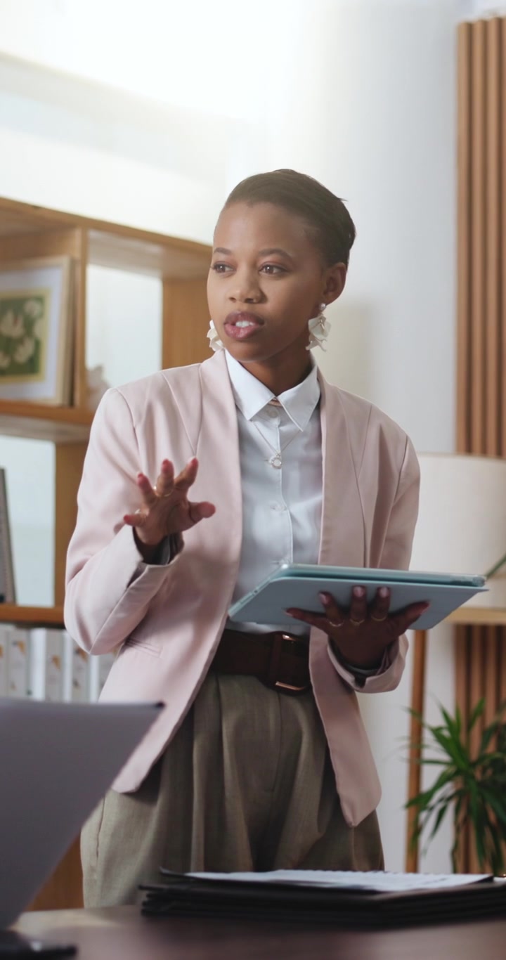Professional Woman Presenting Ideas During Office Meeting