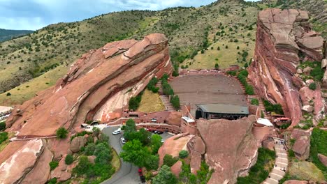 aerial drone pan of famous red rocks amphitheater concert venue in morrison colorado