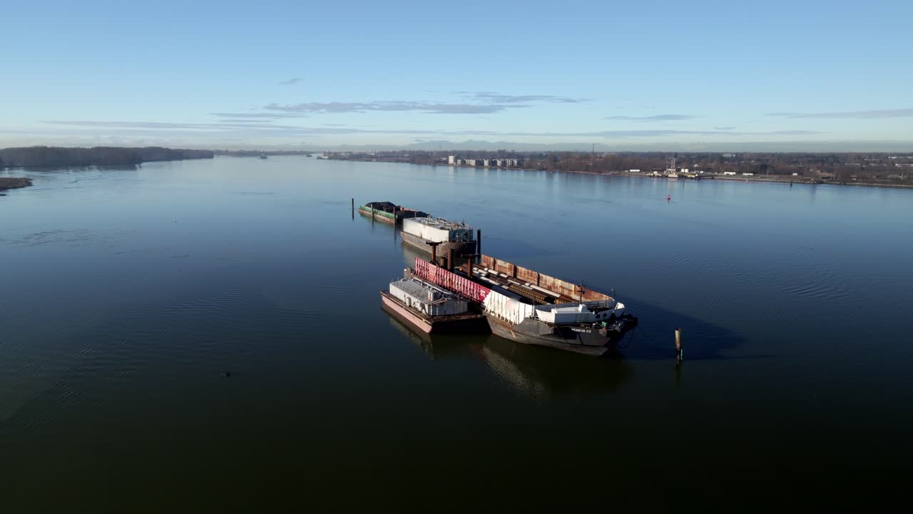 Aerial View Of Freight Vessel In Fraser River In Daytime In Delta, BC, Canada.