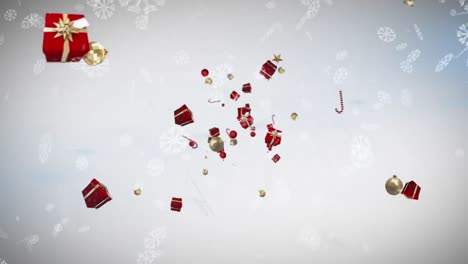 Snowflakes-falling-against-christmas-candy-cane,-bauble-and-gift-icons-floating-on-grey-background