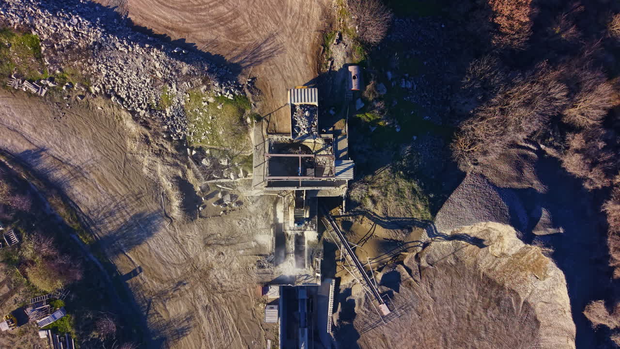 Exploring the abandoned quarry at dusk, a relic of industry surrounded by nature s quiet beauty and a tapestry of shadows and earth tones