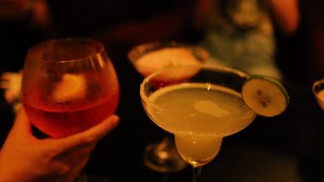 friends enjoying drinks in a lively setting